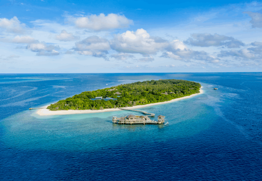 Soneva Fushi - Island Aerial_Julia Neeson @julesandbeyond for Soneva. All images must be credited..png