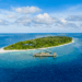 Soneva Fushi - Island Aerial_Julia Neeson @julesandbeyond for Soneva. All images must be credited..png